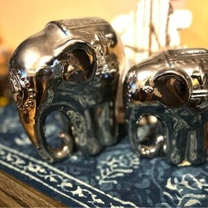 Shiny Silver Elephant Sculptures